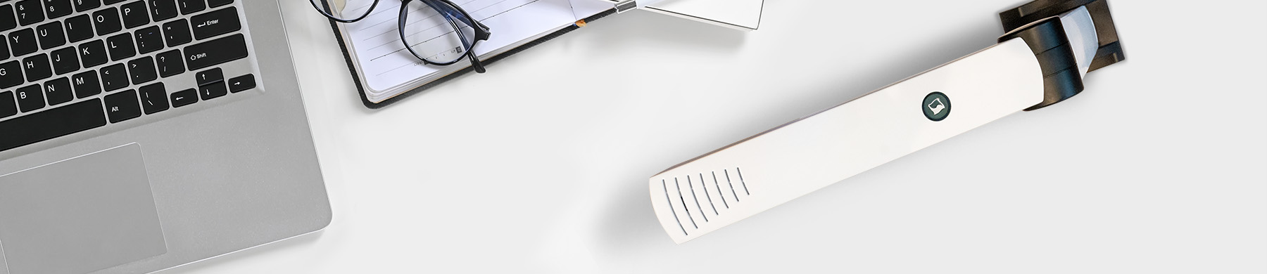 Top view white workspace is surrounding by a coffee cup and vari